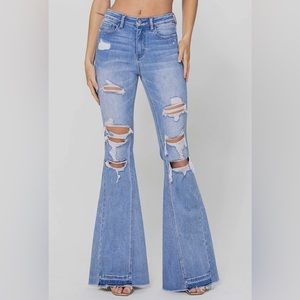 High Rise Flare with Side Panels and Mixed Step Hem